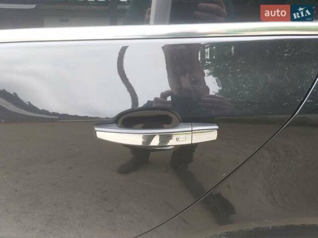 Чорний Опель Інсігнія, об'ємом двигуна 2 л та пробігом 196 тис. км за 13000 $, фото 7 на Automoto.ua