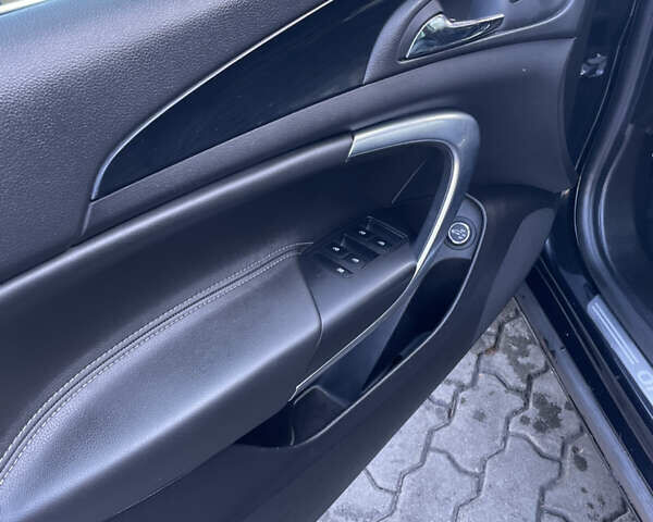 Чорний Опель Інсігнія, об'ємом двигуна 2 л та пробігом 233 тис. км за 12888 $, фото 12 на Automoto.ua