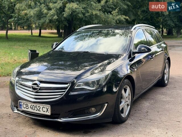Чорний Опель Інсігнія, об'ємом двигуна 2 л та пробігом 293 тис. км за 9900 $, фото 2 на Automoto.ua