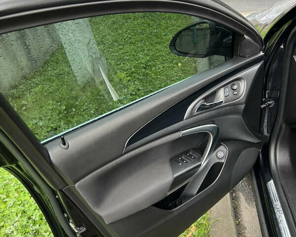 Черный Опель Инсигния, объемом двигателя 1.96 л и пробегом 357 тыс. км за 7500 $, фото 9 на Automoto.ua