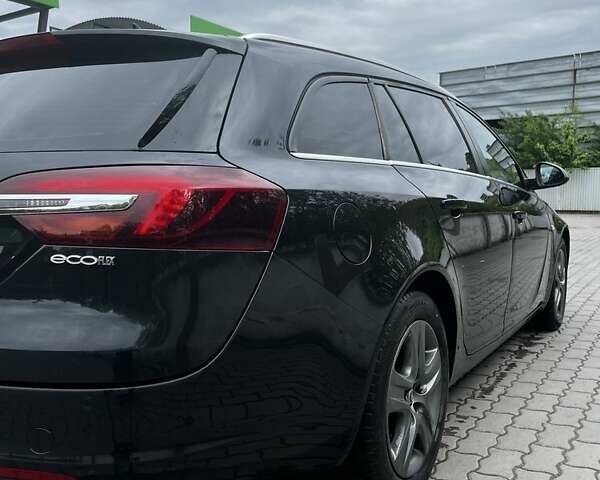 Чорний Опель Інсігнія, об'ємом двигуна 2 л та пробігом 240 тис. км за 8999 $, фото 2 на Automoto.ua