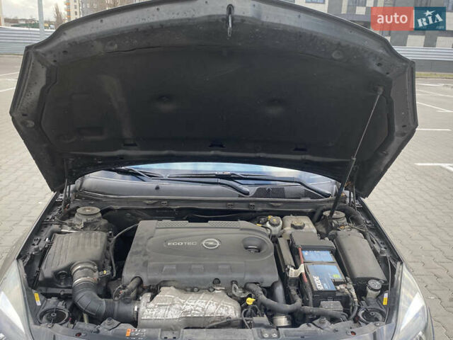 Чорний Опель Інсігнія, об'ємом двигуна 1.96 л та пробігом 242 тис. км за 10600 $, фото 13 на Automoto.ua