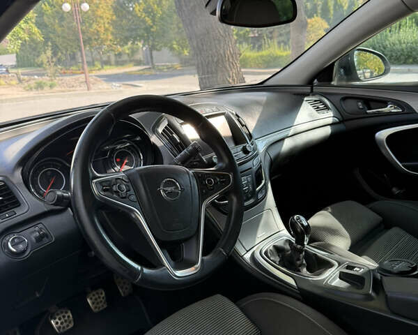 Черный Опель Инсигния, объемом двигателя 1.96 л и пробегом 230 тыс. км за 12000 $, фото 33 на Automoto.ua