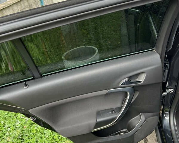 Черный Опель Инсигния, объемом двигателя 1.96 л и пробегом 357 тыс. км за 7500 $, фото 11 на Automoto.ua