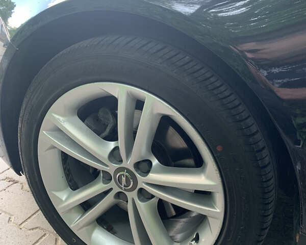 Черный Опель Инсигния, объемом двигателя 2 л и пробегом 349 тыс. км за 9600 $, фото 9 на Automoto.ua