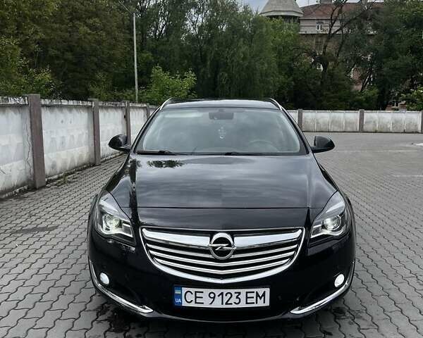 Чорний Опель Інсігнія, об'ємом двигуна 2 л та пробігом 240 тис. км за 8999 $, фото 7 на Automoto.ua