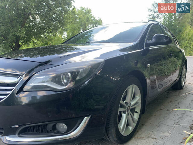 Черный Опель Инсигния, объемом двигателя 2 л и пробегом 349 тыс. км за 9600 $, фото 3 на Automoto.ua