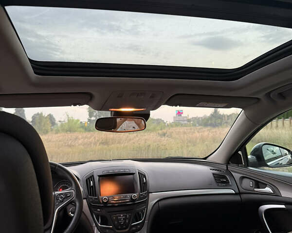 Черный Опель Инсигния, объемом двигателя 1.96 л и пробегом 230 тыс. км за 12000 $, фото 25 на Automoto.ua