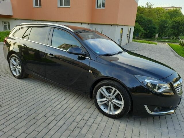 Чорний Опель Інсігнія, об'ємом двигуна 1.96 л та пробігом 219 тис. км за 10800 $, фото 2 на Automoto.ua