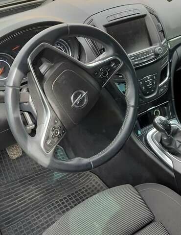 Чорний Опель Інсігнія, об'ємом двигуна 2 л та пробігом 240 тис. км за 10100 $, фото 2 на Automoto.ua