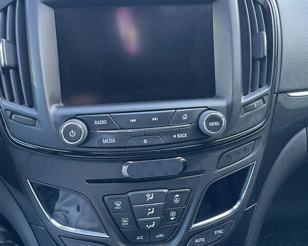 Чорний Опель Інсігнія, об'ємом двигуна 2 л та пробігом 233 тис. км за 12888 $, фото 26 на Automoto.ua