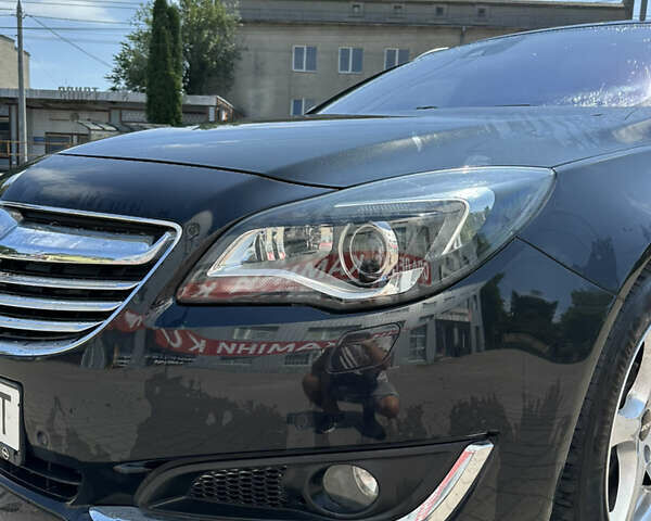 Чорний Опель Інсігнія, об'ємом двигуна 2 л та пробігом 252 тис. км за 10600 $, фото 12 на Automoto.ua