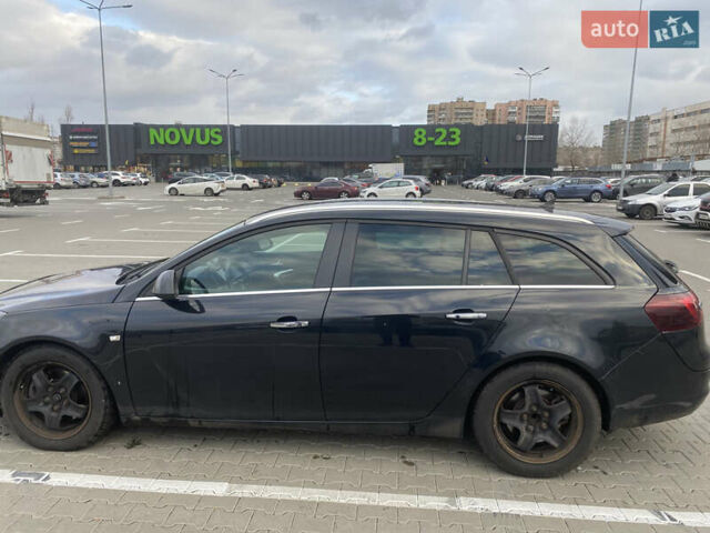 Чорний Опель Інсігнія, об'ємом двигуна 1.96 л та пробігом 242 тис. км за 10600 $, фото 2 на Automoto.ua