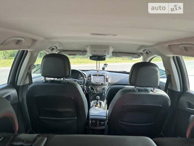 Чорний Опель Інсігнія, об'ємом двигуна 1.96 л та пробігом 300 тис. км за 8700 $, фото 4 на Automoto.ua