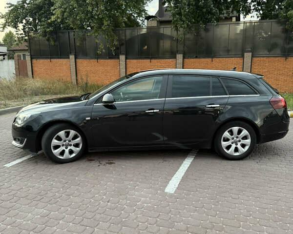 Черный Опель Инсигния, объемом двигателя 1.96 л и пробегом 230 тыс. км за 12000 $, фото 4 на Automoto.ua