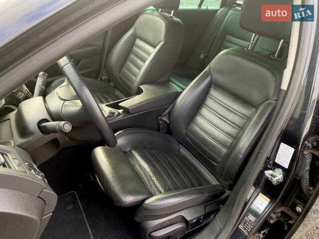 Чорний Опель Інсігнія, об'ємом двигуна 1.96 л та пробігом 170 тис. км за 11900 $, фото 9 на Automoto.ua