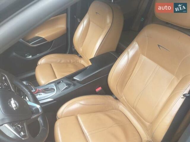 Чорний Опель Інсігнія, об'ємом двигуна 2 л та пробігом 196 тис. км за 13000 $, фото 9 на Automoto.ua