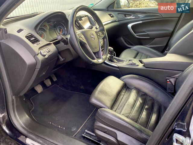 Чорний Опель Інсігнія, об'ємом двигуна 1.96 л та пробігом 170 тис. км за 11900 $, фото 6 на Automoto.ua