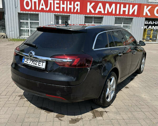 Чорний Опель Інсігнія, об'ємом двигуна 2 л та пробігом 252 тис. км за 10600 $, фото 7 на Automoto.ua