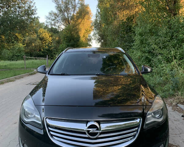 Черный Опель Инсигния, объемом двигателя 2 л и пробегом 349 тыс. км за 9600 $, фото 1 на Automoto.ua