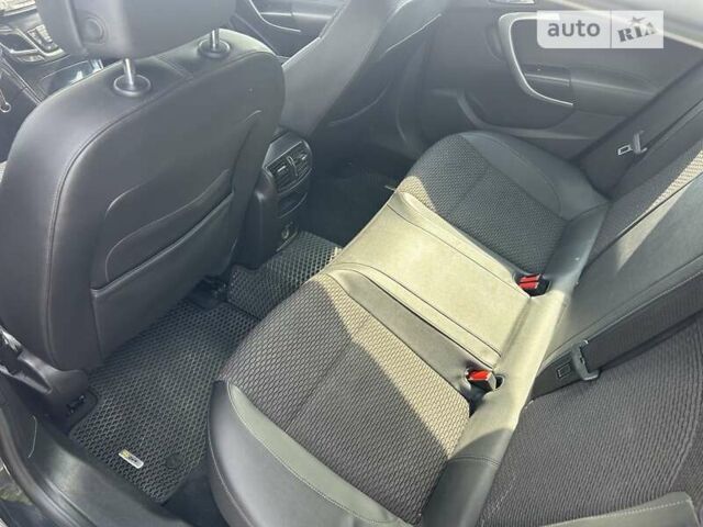 Чорний Опель Інсігнія, об'ємом двигуна 1.96 л та пробігом 300 тис. км за 8700 $, фото 7 на Automoto.ua