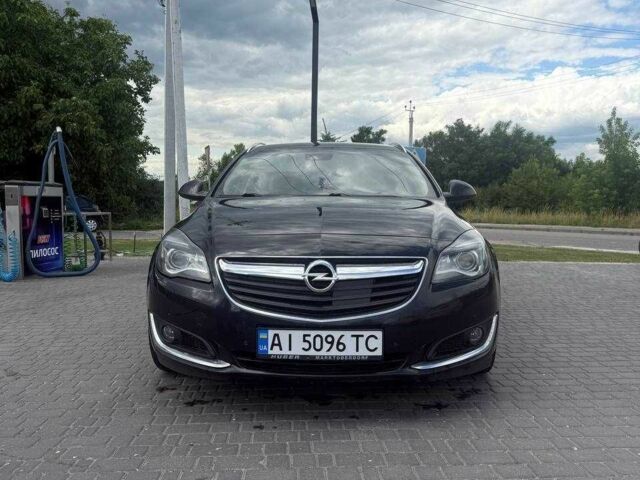 Черный Опель Инсигния, объемом двигателя 2 л и пробегом 260 тыс. км за 9518 $, фото 1 на Automoto.ua
