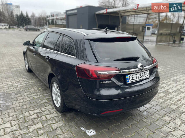 Чорний Опель Інсігнія, об'ємом двигуна 1.96 л та пробігом 250 тис. км за 8700 $, фото 8 на Automoto.ua