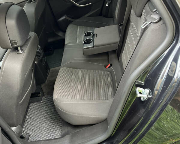 Черный Опель Инсигния, объемом двигателя 1.96 л и пробегом 357 тыс. км за 7500 $, фото 12 на Automoto.ua