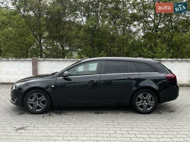 Чорний Опель Інсігнія, об'ємом двигуна 2 л та пробігом 240 тис. км за 8999 $, фото 1 на Automoto.ua