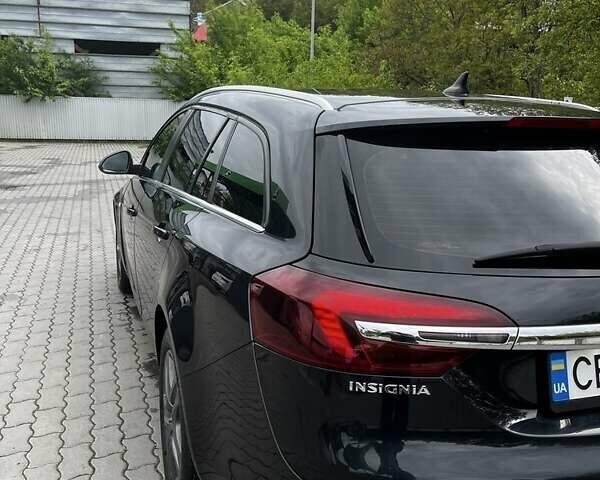 Чорний Опель Інсігнія, об'ємом двигуна 2 л та пробігом 240 тис. км за 8999 $, фото 3 на Automoto.ua