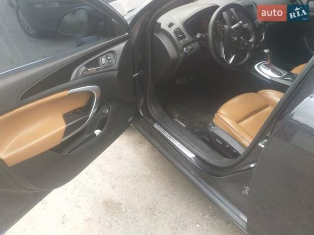 Чорний Опель Інсігнія, об'ємом двигуна 2 л та пробігом 196 тис. км за 13000 $, фото 53 на Automoto.ua