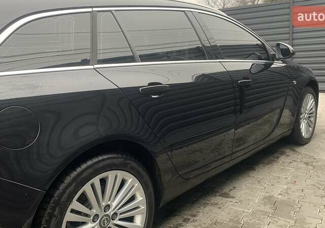 Чорний Опель Інсігнія, об'ємом двигуна 1.96 л та пробігом 193 тис. км за 10700 $, фото 4 на Automoto.ua