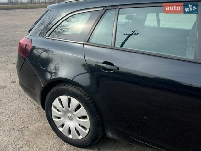 Чорний Опель Інсігнія, об'ємом двигуна 2 л та пробігом 320 тис. км за 9000 $, фото 10 на Automoto.ua