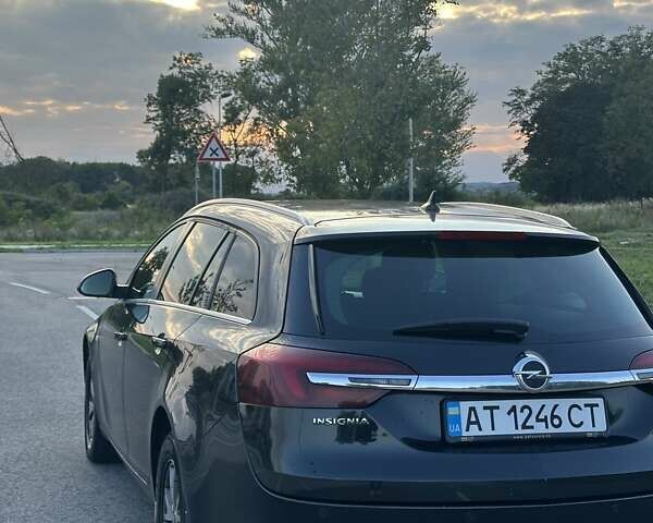 Чорний Опель Інсігнія, об'ємом двигуна 2 л та пробігом 243 тис. км за 9499 $, фото 5 на Automoto.ua