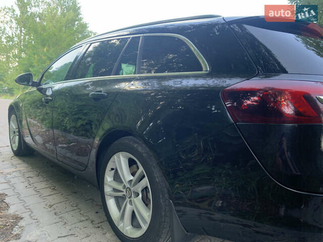 Черный Опель Инсигния, объемом двигателя 2 л и пробегом 349 тыс. км за 9600 $, фото 5 на Automoto.ua