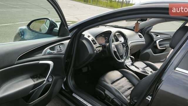 Черный Опель Инсигния, объемом двигателя 1.96 л и пробегом 281 тыс. км за 11200 $, фото 5 на Automoto.ua