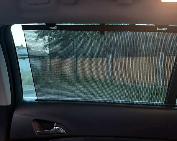 Черный Опель Инсигния, объемом двигателя 1.96 л и пробегом 230 тыс. км за 12000 $, фото 23 на Automoto.ua