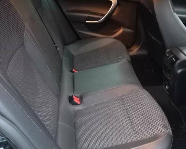 Черный Опель Инсигния, объемом двигателя 1.96 л и пробегом 318 тыс. км за 7900 $, фото 6 на Automoto.ua