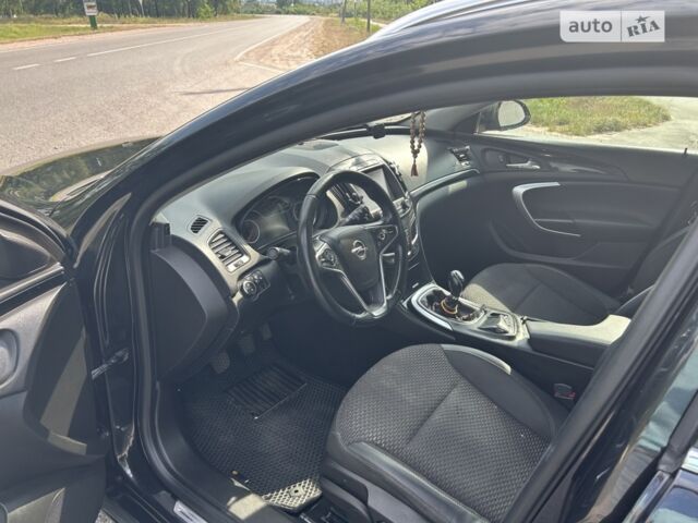 Чорний Опель Інсігнія, об'ємом двигуна 1.96 л та пробігом 300 тис. км за 8200 $, фото 10 на Automoto.ua