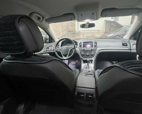 Черный Опель Инсигния, объемом двигателя 1.96 л и пробегом 285 тыс. км за 9800 $, фото 7 на Automoto.ua