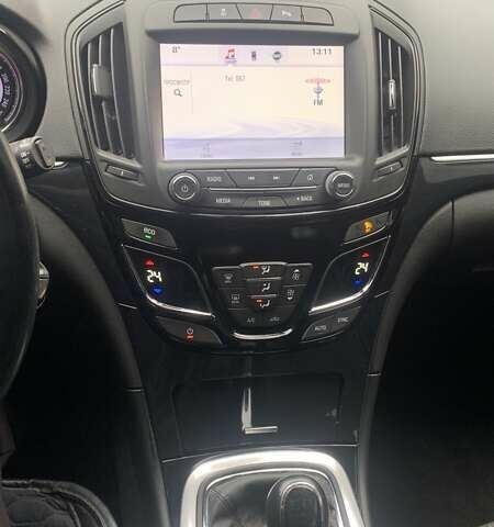 Чорний Опель Інсігнія, об'ємом двигуна 1.96 л та пробігом 193 тис. км за 10700 $, фото 8 на Automoto.ua