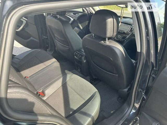 Чорний Опель Інсігнія, об'ємом двигуна 1.96 л та пробігом 300 тис. км за 8700 $, фото 6 на Automoto.ua