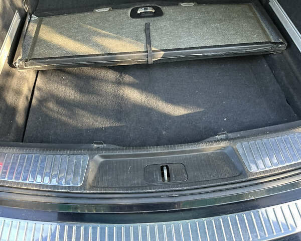 Чорний Опель Інсігнія, об'ємом двигуна 1.6 л та пробігом 208 тис. км за 8999 $, фото 8 на Automoto.ua