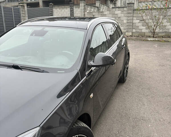 Черный Опель Инсигния, объемом двигателя 1.96 л и пробегом 312 тыс. км за 10500 $, фото 7 на Automoto.ua