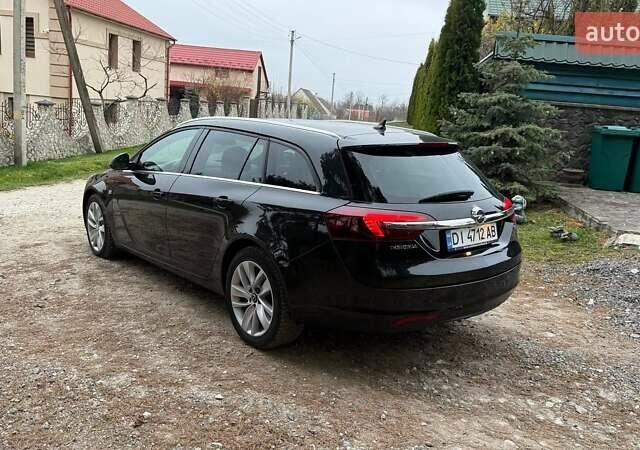 Черный Опель Инсигния, объемом двигателя 2 л и пробегом 270 тыс. км за 9500 $, фото 1 на Automoto.ua