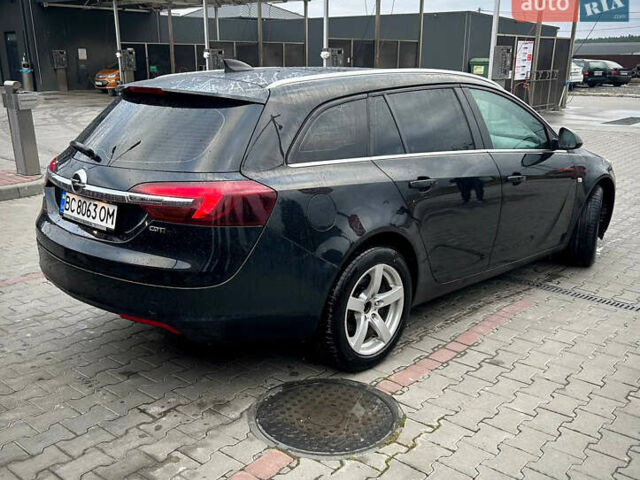 Чорний Опель Інсігнія, об'ємом двигуна 1.6 л та пробігом 304 тис. км за 9100 $, фото 2 на Automoto.ua