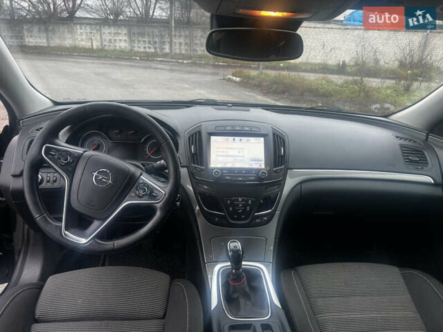 Чорний Опель Інсігнія, об'ємом двигуна 1.6 л та пробігом 210 тис. км за 8400 $, фото 5 на Automoto.ua