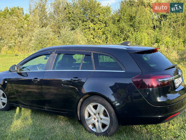 Чорний Опель Інсігнія, об'ємом двигуна 1.6 л та пробігом 208 тис. км за 8999 $, фото 2 на Automoto.ua