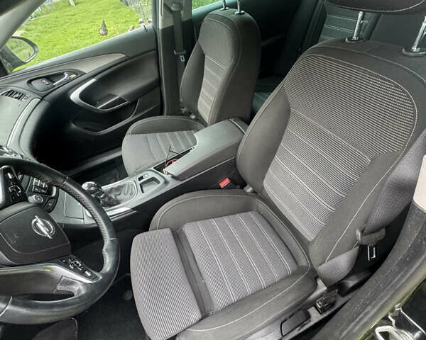 Чорний Опель Інсігнія, об'ємом двигуна 1.6 л та пробігом 208 тис. км за 8999 $, фото 18 на Automoto.ua