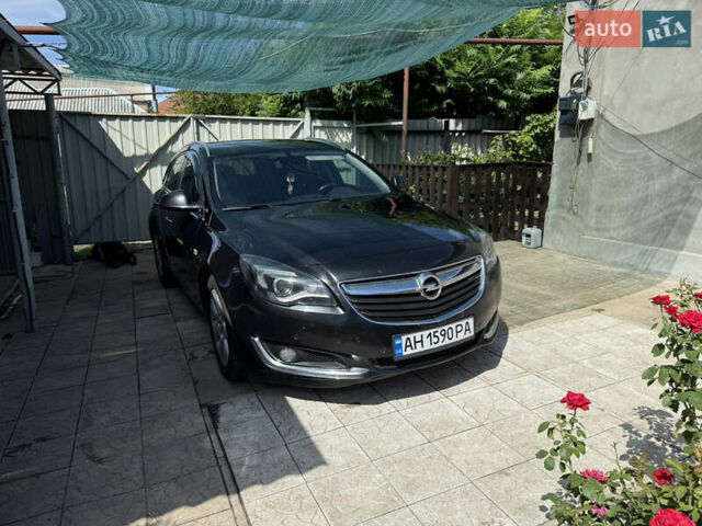 Черный Опель Инсигния, объемом двигателя 2 л и пробегом 185 тыс. км за 10900 $, фото 1 на Automoto.ua
